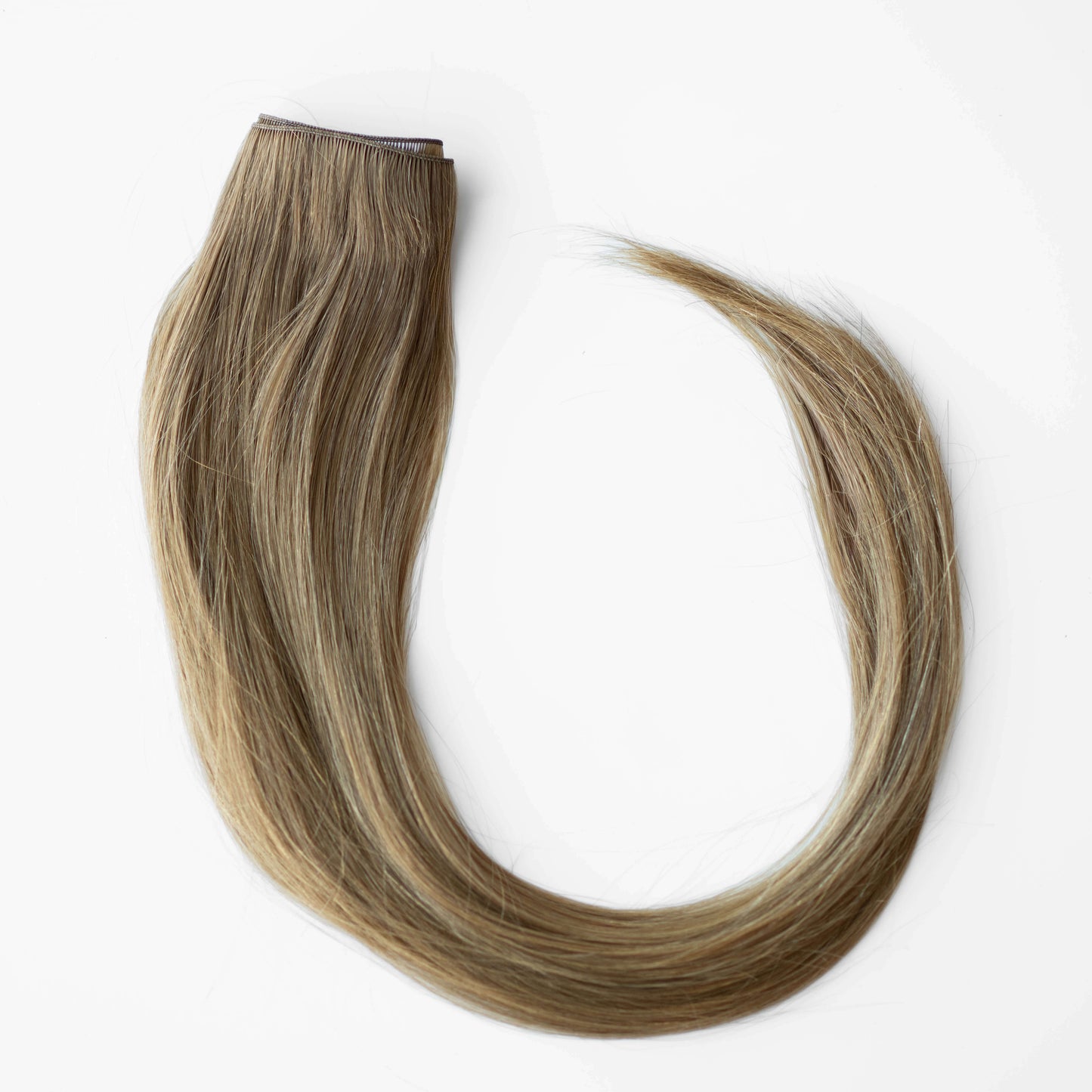 Blonde hair extensions on a white background